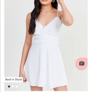 White sleeveless Altar’d State “Adaylnn” dress..